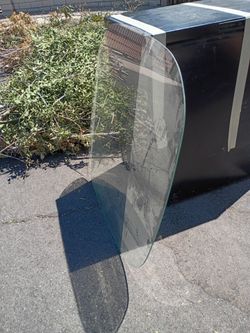 FREE GLASS TABLETOP, 32", Tempered glass, rounded corners, No scratches, No chips. Free pick up on sidewalk. Do NOT ASK if it's available!!!