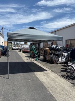 They're new but slightly dirty or worn. Gray 10ft x 10ft Instant Shade Canopy Pop-Up Tent. $75
