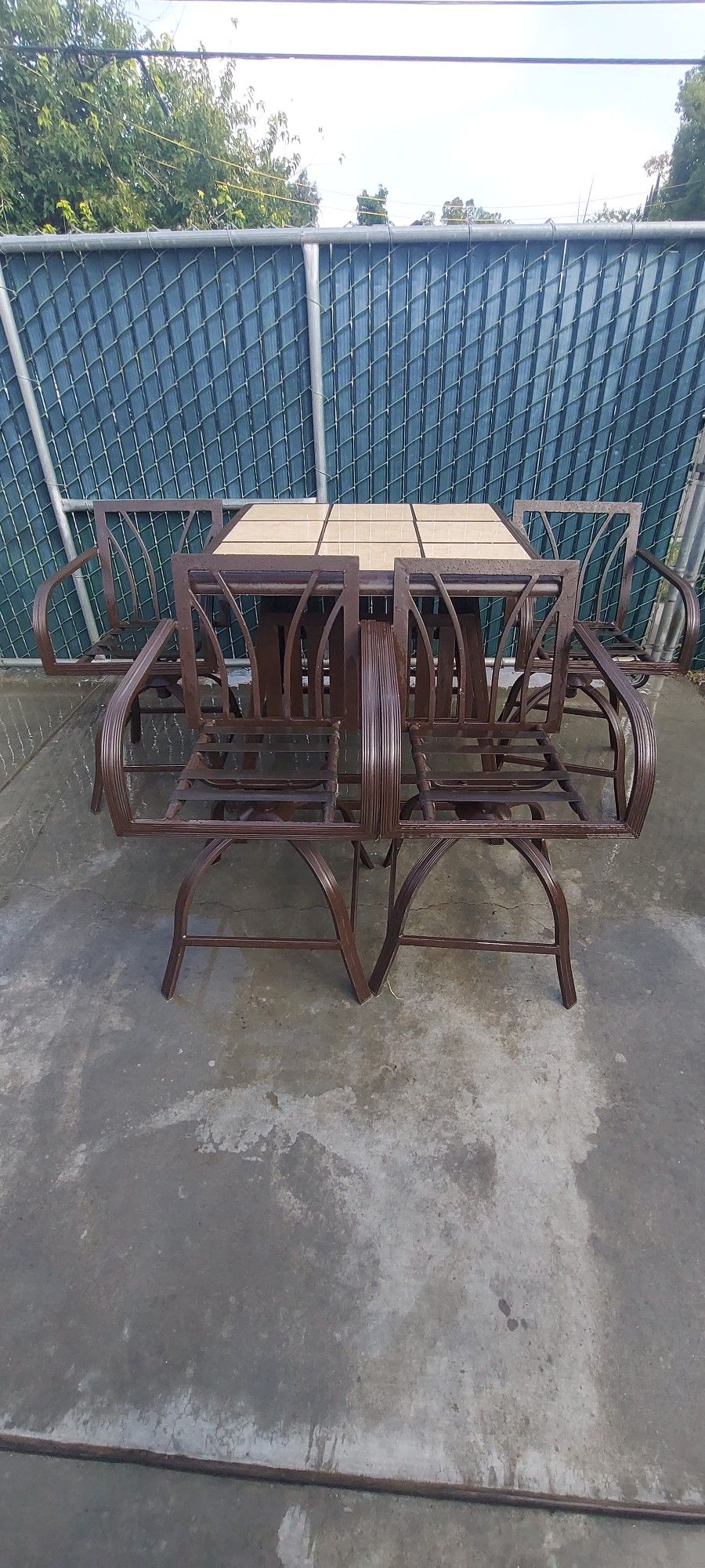 Used Hampton bay Bar High 5  piece  outdoor Tile Top table 4 chairs