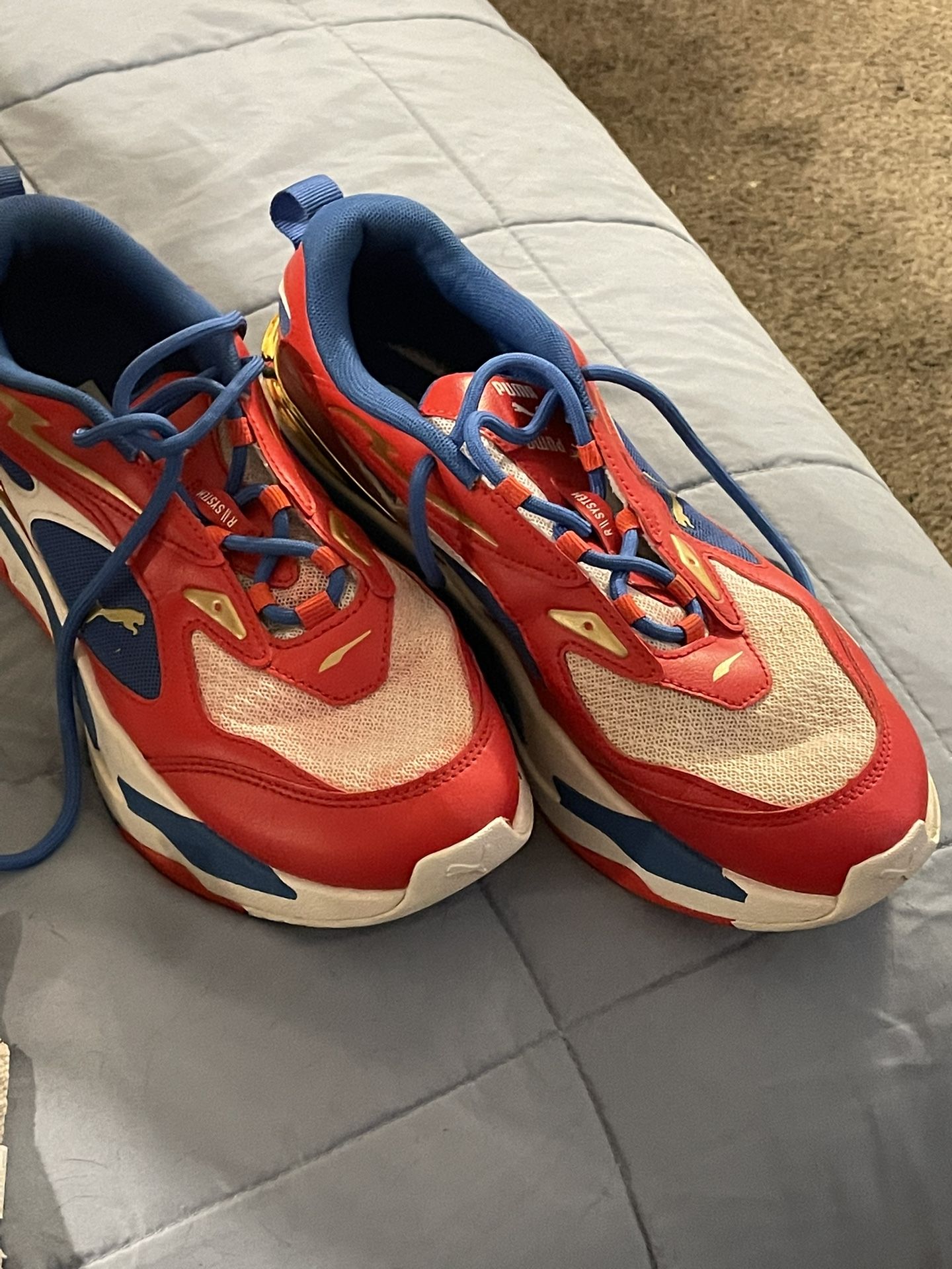Men’s Size 10 Pumas, Red, White And Blue lightly used