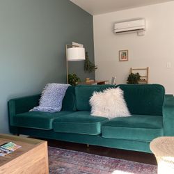 Statement green velvet couch