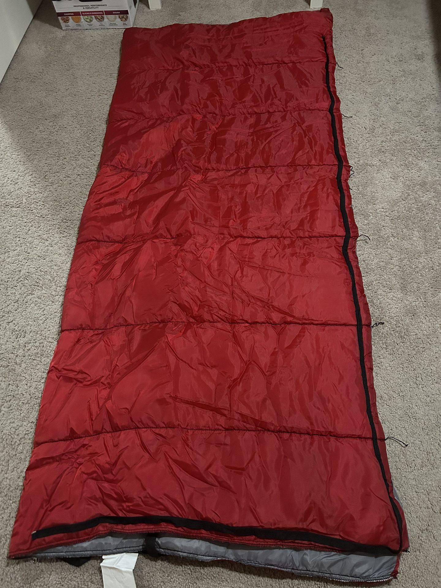 Two sleeping bags- Ozark Trail 50-Degree Warm Weather Red Sleeping Bag, 33"x75"