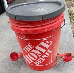 Home Depot bucket used for water for the chickens