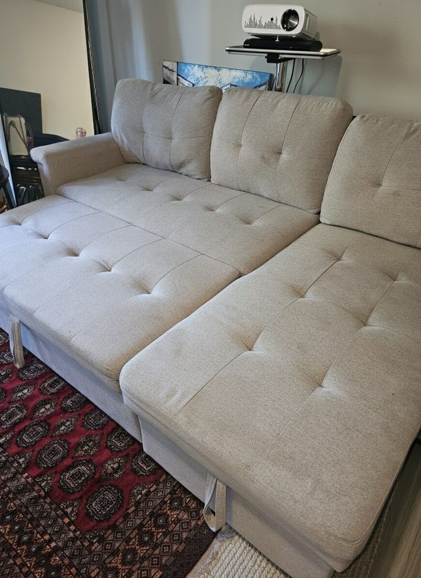 MOVING SALE Light Grey Sleeper/Pull Out Sectional - Reversible, Storage and Charging Ports