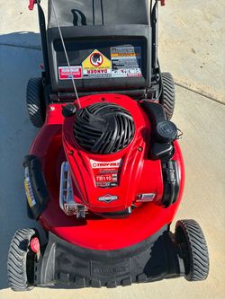 Troy-bilt push lawnmower starts right up runs perfect. Very good condition.