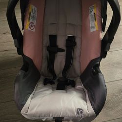 GIRLS BABYTREND  CARSEAT WITH BASE 