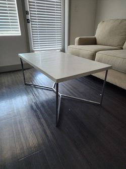Faux marble top coffee table with metal base