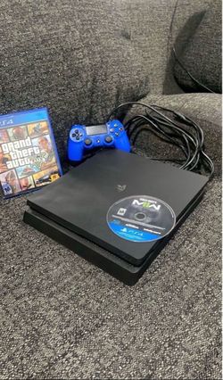 PS4 Slim Console with Controller and Games