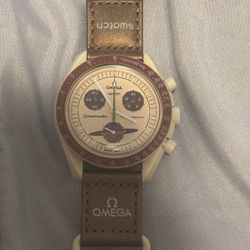 Omega swatch moonswatch speedmaster n Saturn