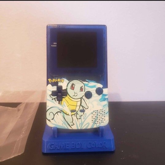 Custom Pokémon Squirtle Nintendo Gameboy Color, 3D printed stand, no game selling for only $180.
New/freshly done condition
Guts are genuine Nintend