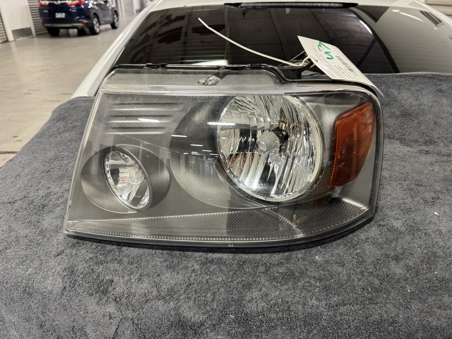 Driver Headlight Medium Platinum Background Fits 07-08 FORD F150 PICKUP 