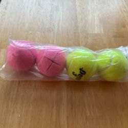Pack of four tennis balls made for WALKERS