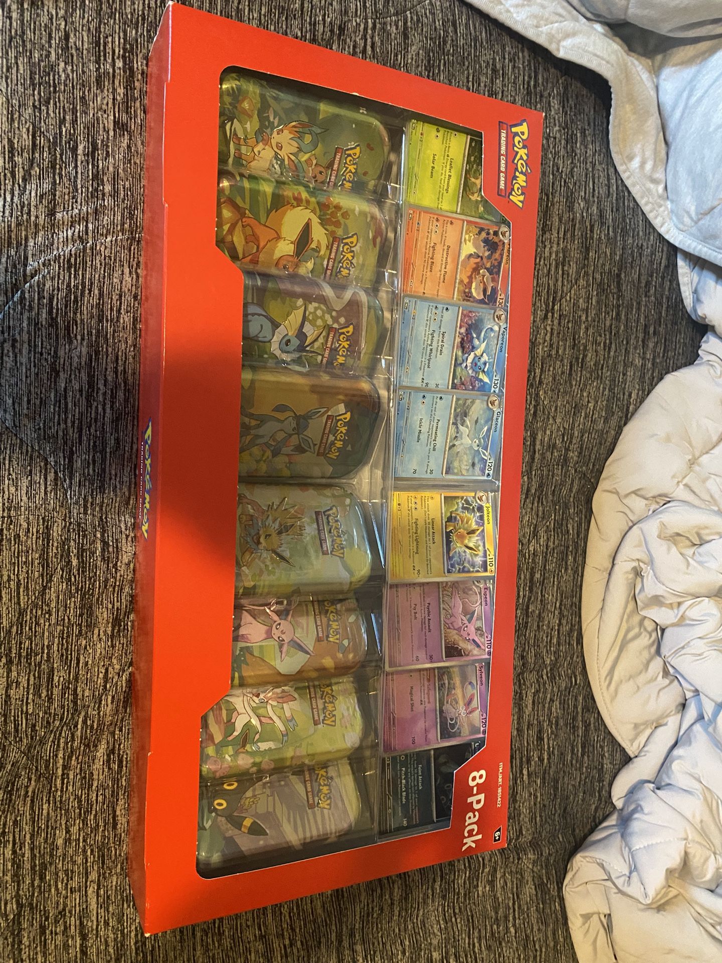 Prismatic Evolutions Eight Pack Mini Tins