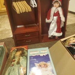 Lot of antique porcelain dolls with mini wooden closet