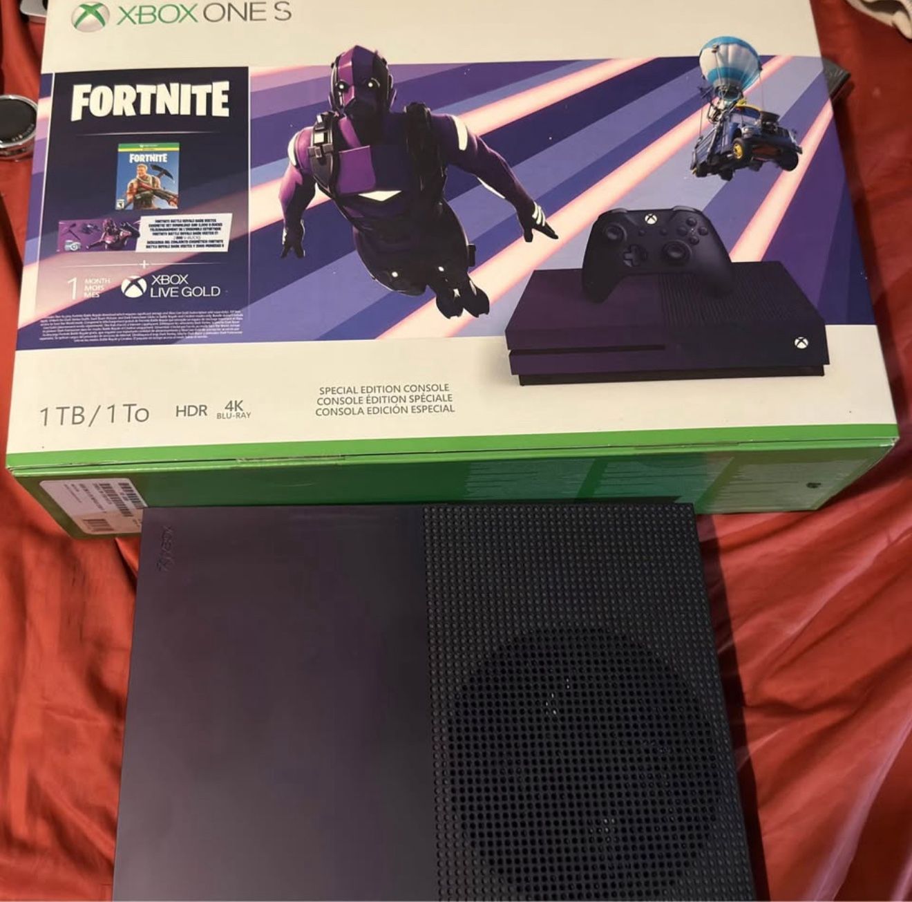 The Xbox One S Mint Limited Edition Fornite. Lack And Purple