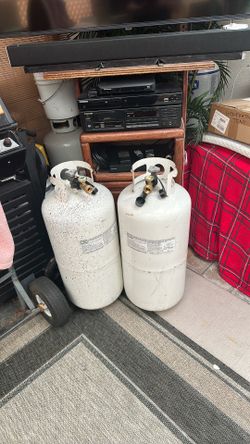 Two 40 pound propane tanks 10 gallons each