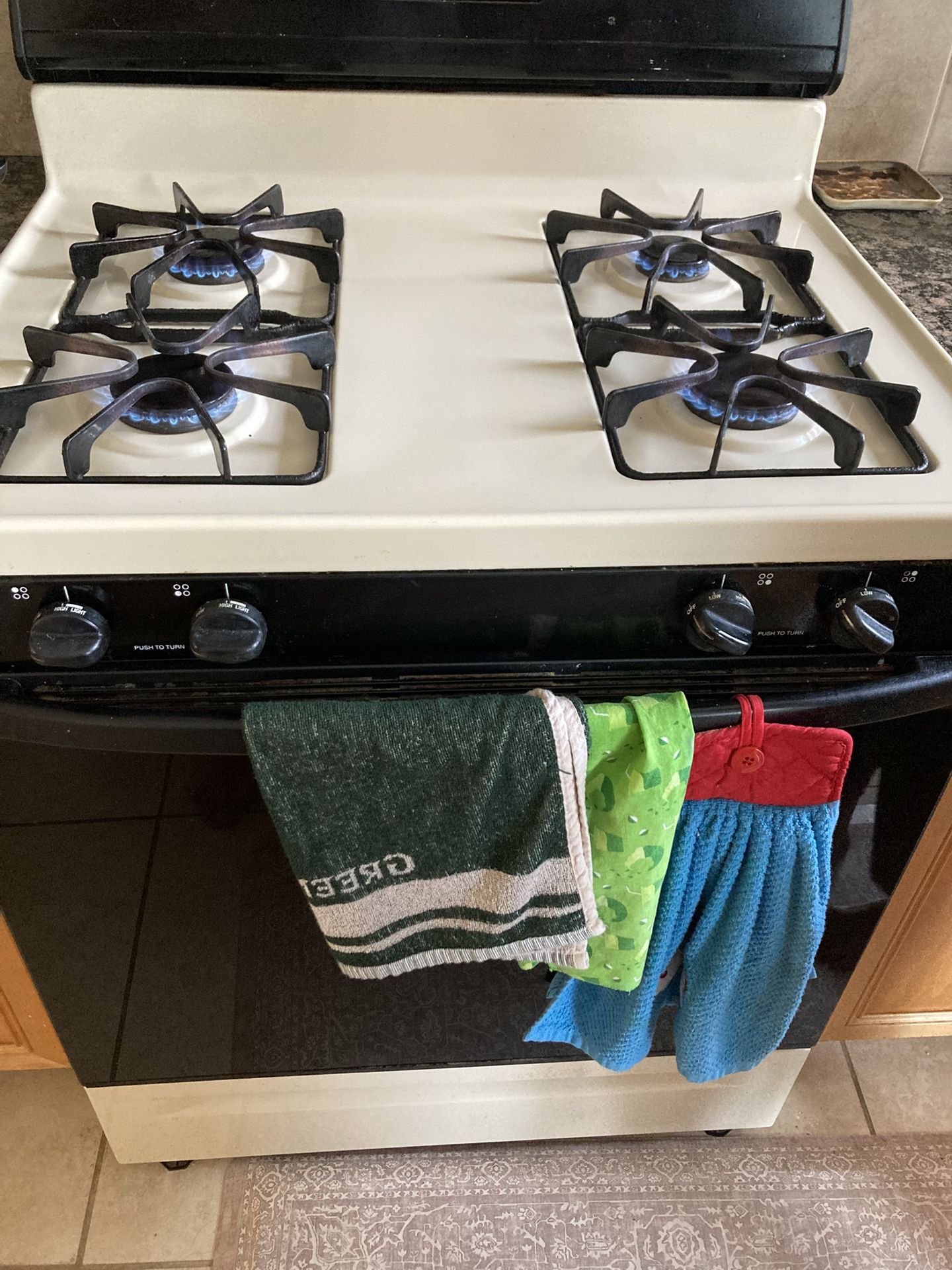 Washer-dryer, Gas Range , Dishwasher Westinghouse Brand . Overhead Microwave G E Brand