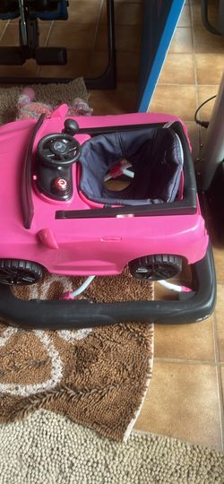 Ford Mustang, baby jumper and walker