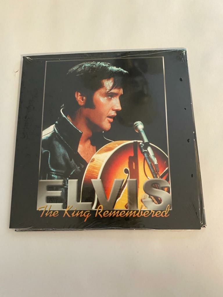 Brand new hardback Elvis Presley Collectible book with CD