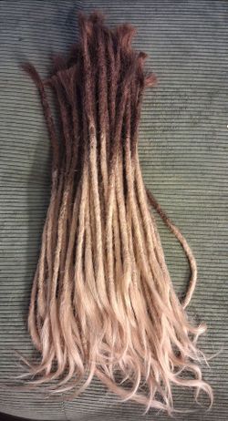 Dreadlocks. Opened ended, brown to honey blond. HUMAN HAIR!