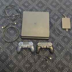 PS4 Slim Two Controllers And 2 TB External Storage
