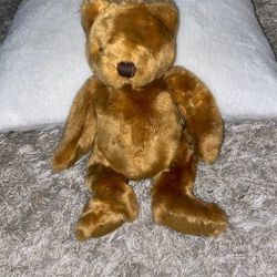 A classic brown teddy bear stuffed animals.  11”