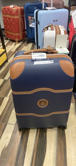 Delsey Paris Hard Shell Spinner Luggage