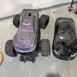 Two Radio Controlled Cars and Accessories