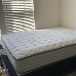 Queen sized mattress with bed frame and spring box