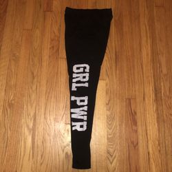 Size large Girl Power black and white leggings. The lettering stuck together from the dryer and can be seen in the pictures