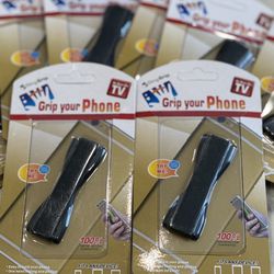 Phone Grip Black - Brand New  Brand new phone grip in black for all uncial phone or case Low-profile Effortless Grip Ultra Strong 3M Adhesive 9 availa