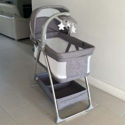 Bedside Bassinet Portable Crib With Activity Mobile Arm With Nightlight, Rotating Stars Size 33.5”Lx 20”Wx 46”H Color Grey Tweed