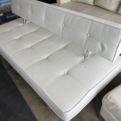 White leather couch and futon