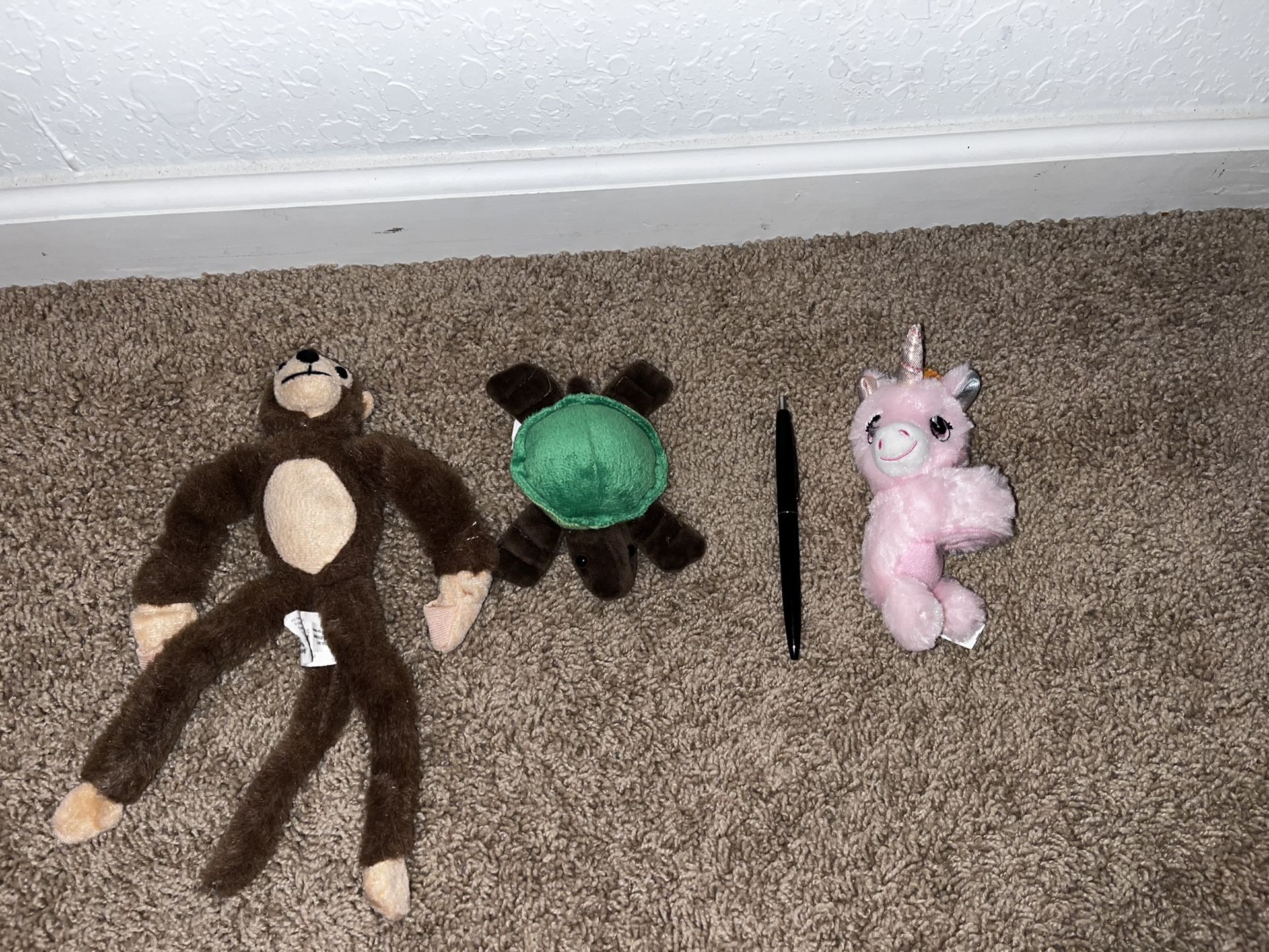 Unicorn wristlet, turtle and monkey (extends the arms)