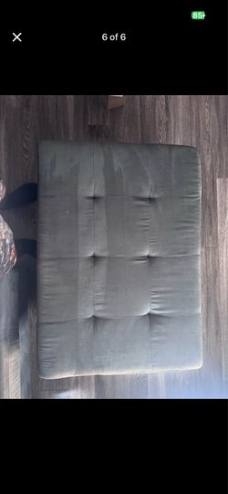 Grey sectional with ottoman