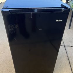 Black Haier mini fridge 