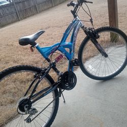 Next 26” 21 speed aluminum alloy mega light plush blue, silver, pink, black & white full suspension mountain bike