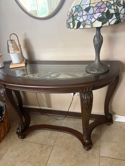 Traditional Wood Demilune Console Table with Glass Top and Metal Scrollwork