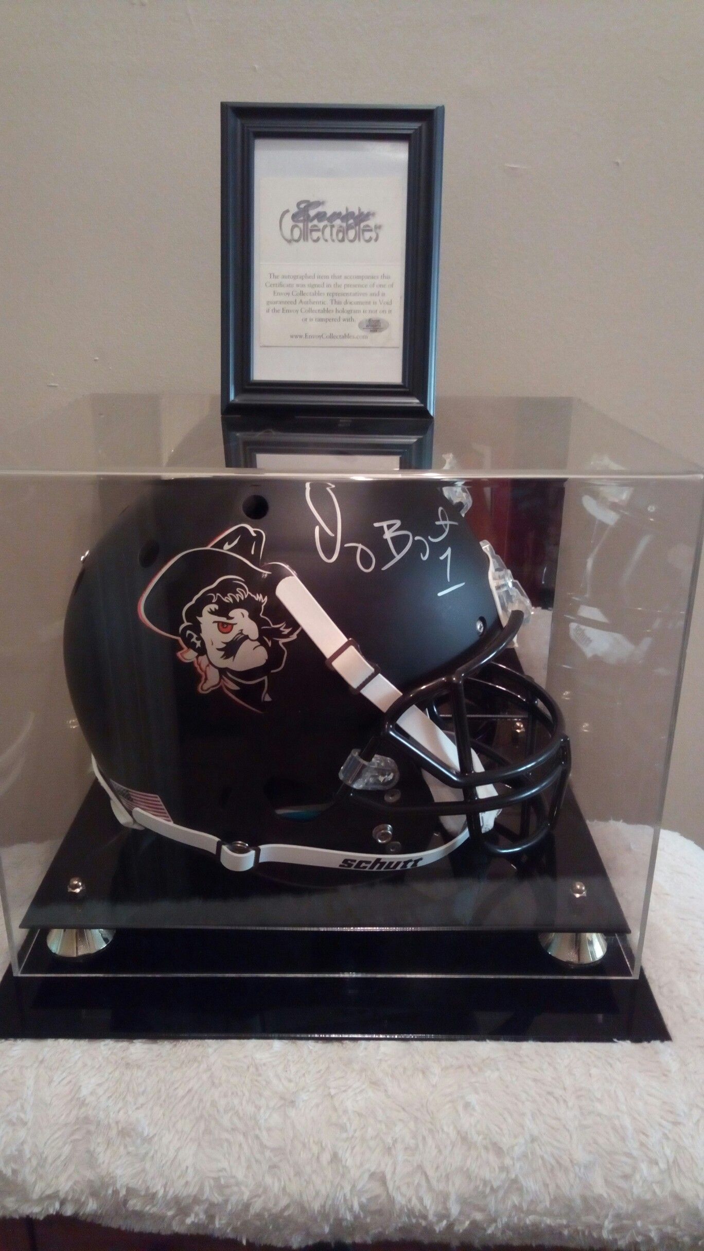 Rare " dez Bryant Oklahoma cowboy's signed blackout helmet in mirrored display case with certificate of authenticity