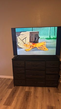 black sectional couch & smart tv
