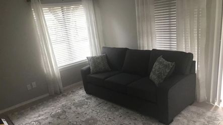3-seater Ashley Furniture Sofa
