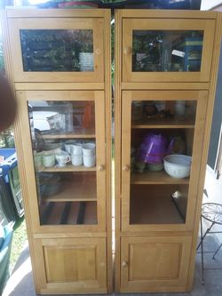 Oak cabinets w/ removable crown molding tops and lights.