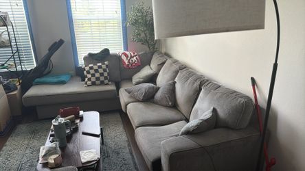 Sectional and ottoman (gray)