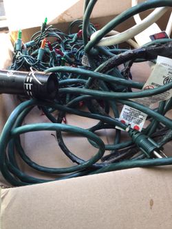 Assorted outdoor electronics 4 items: string lights, power strip, extension cord, flashlight