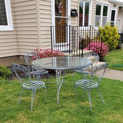 Vintage Wrought Iron Patio Set With Glass Top table