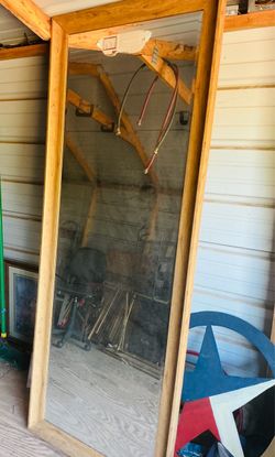 Large Wood Framed Full Length Mirror it’s 75 inches tall and 24 inches wide