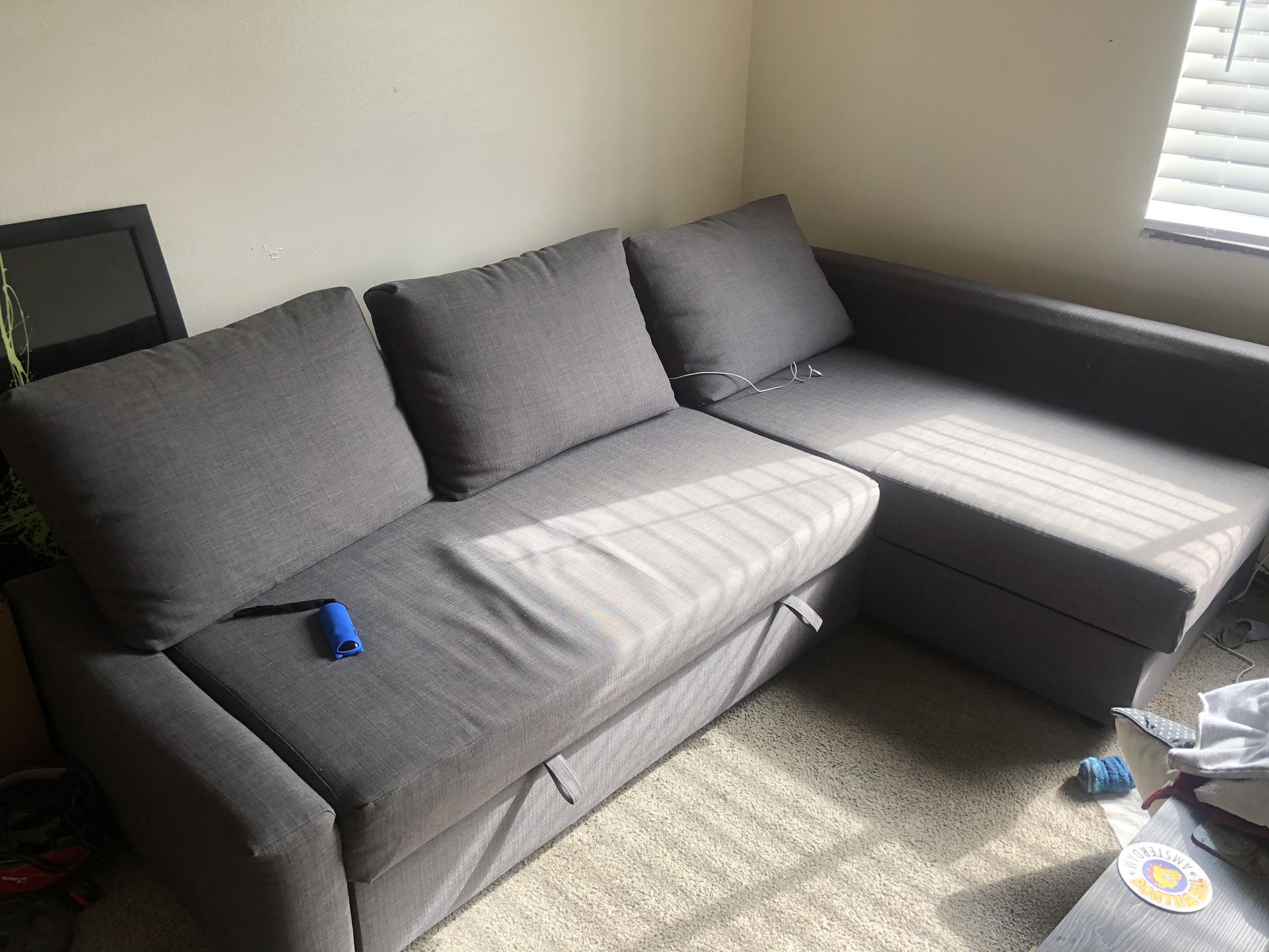L Shaped Couch - Has Extra Storage And Can Turn Into A Sofa Bed. No Major Defects 