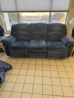Blue sofa with 2 reclining seats