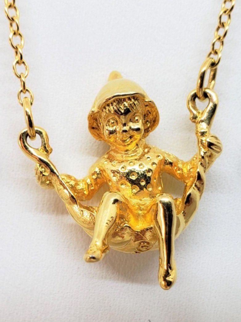 Vintage 1980s Happy Elf necklace, Franklin Mint 24K Gold Electroplated spirit fairy pendant, good luck charm. 18 in. Pendant is 1 in by 1 in.