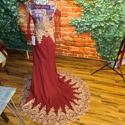 Maroon red wedding gown with gold work and rainbow stones